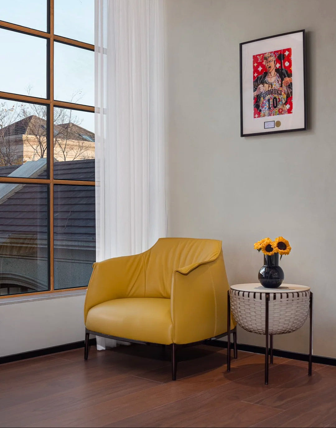 A modern mustard yellow rich leather plume armchair