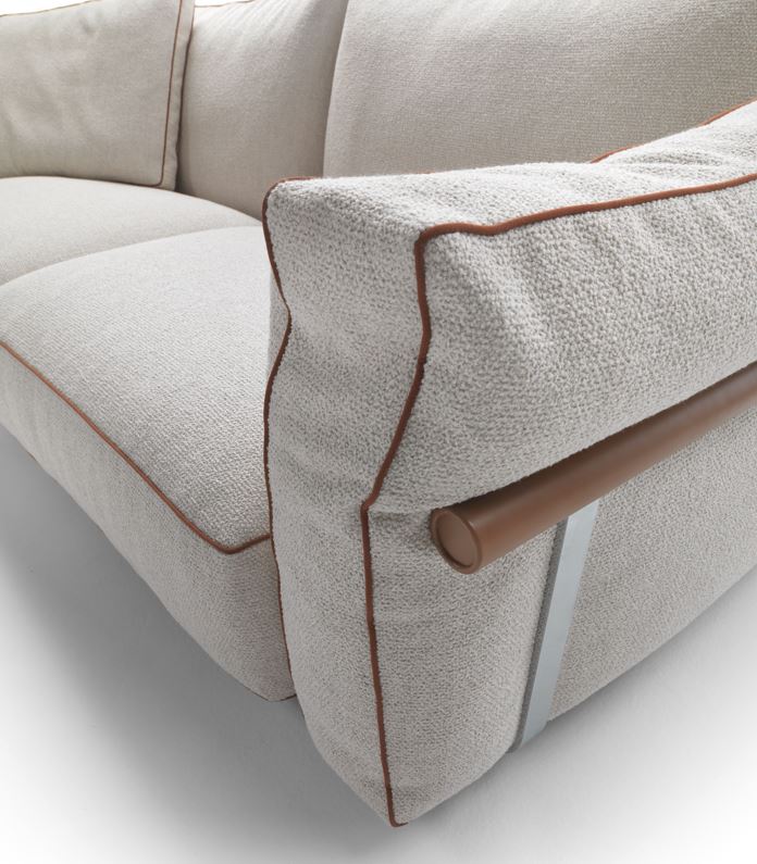 Arthur Modular Sofa close-up in textured ivory fabric with contrast piping and metal frame