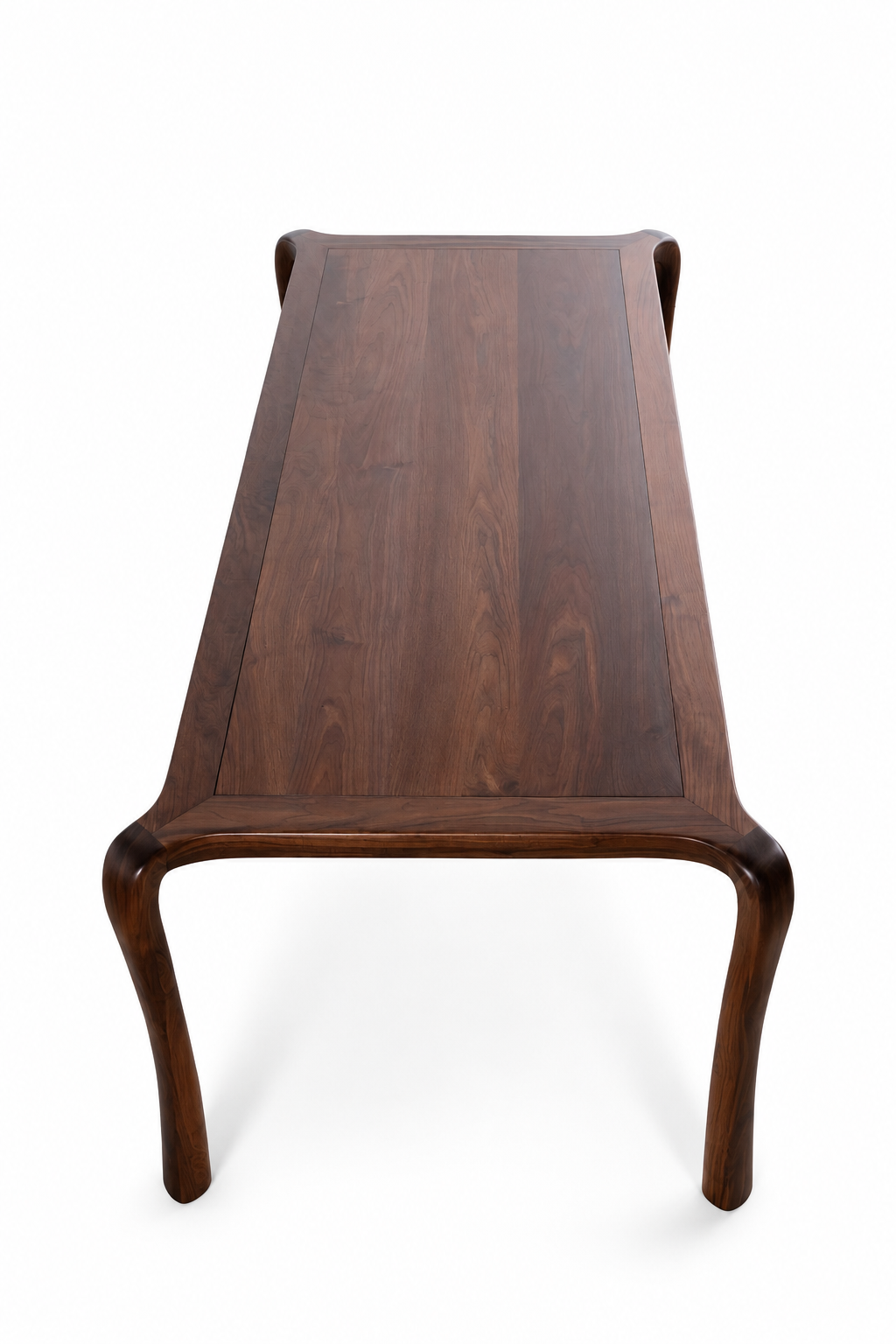 A dark brown American walnut wooden table with a rectangular top and gracefully curved legs, shown from a top-down perspective on a white background highlighting the natural grains.