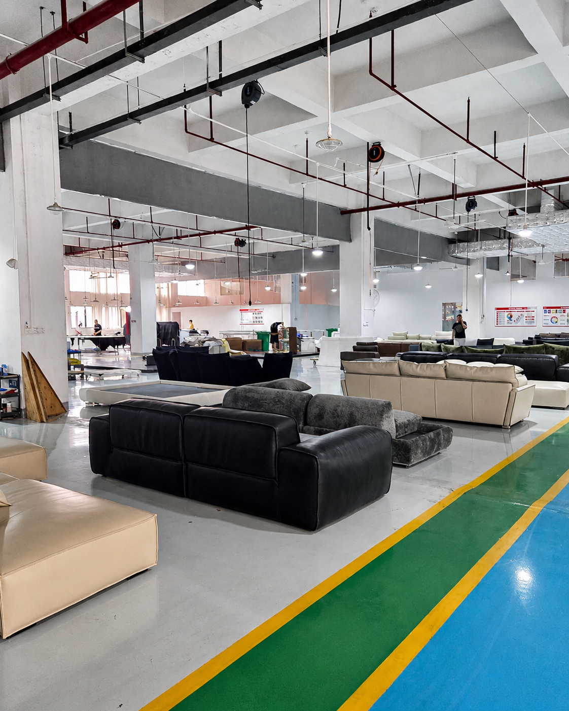 NX Interiors factory partner workshop with sofas in production