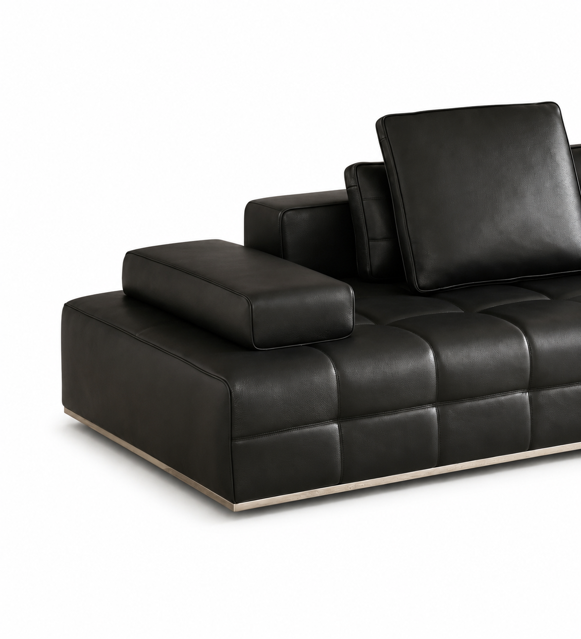 A modern black leather sectional sofa with a tufted grid pattern on the seat and back cushions, featuring a square armrest and a matching back cushion, shown on a white background.