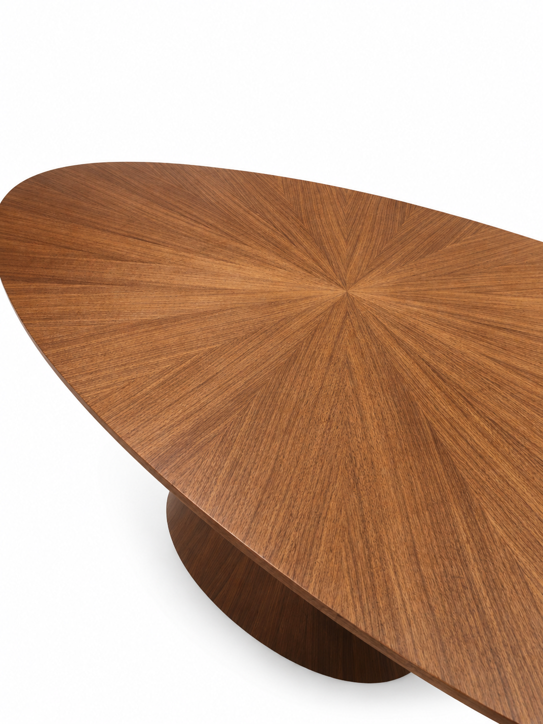 Close-up of an oval wooden table top with a sunburst grain pattern and a round pedestal base, shown on a white background.