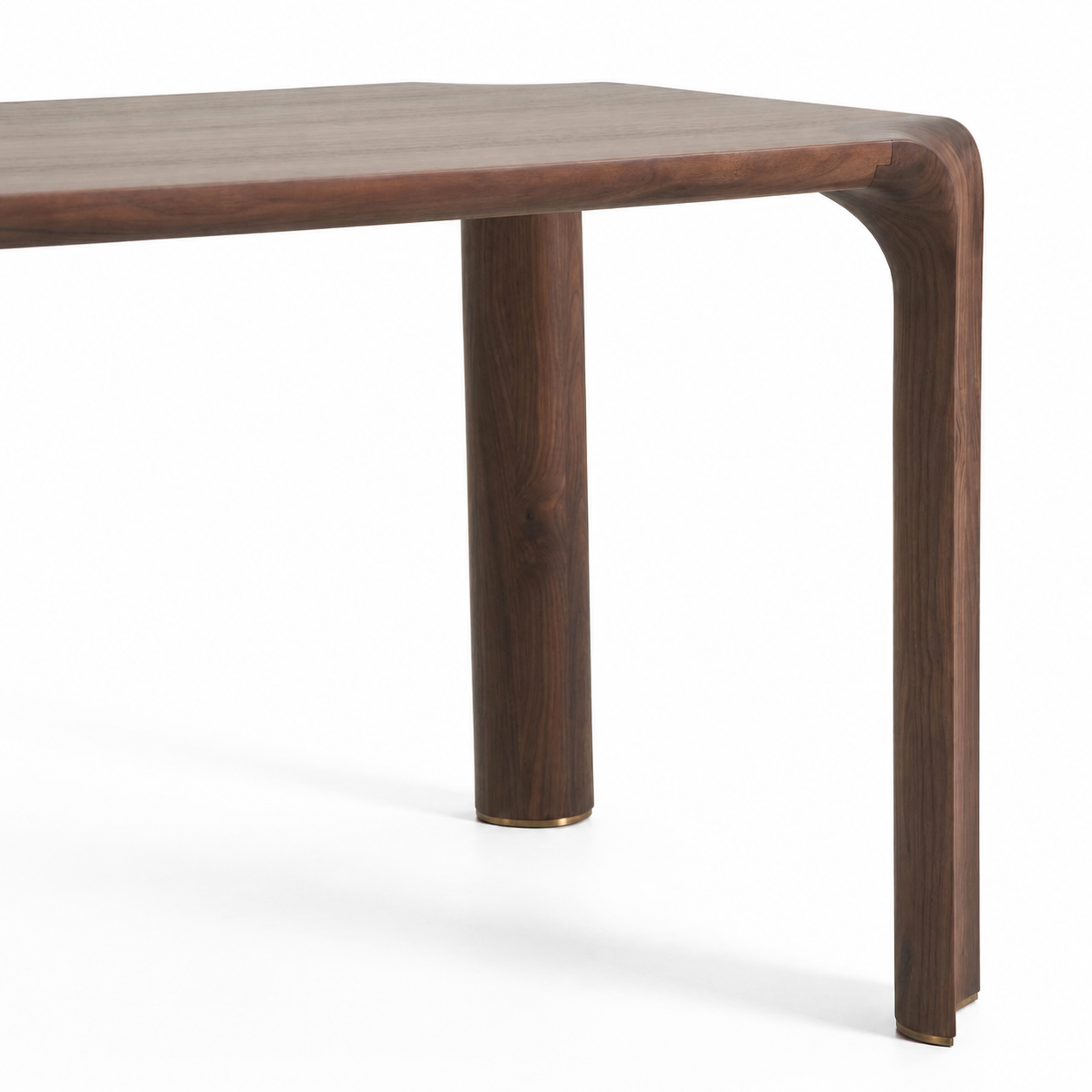 Wooden table with a curved leg design on a white background