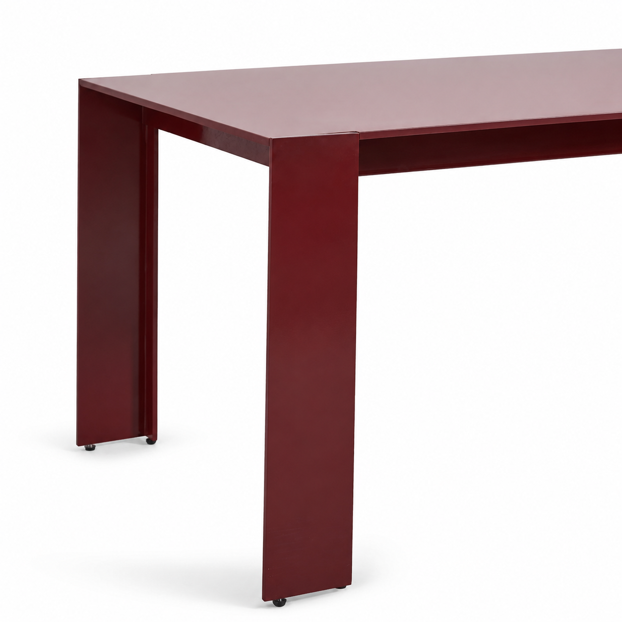 A modern rectangular table with a glossy dark red finish, featuring a thick top and thick block legs, shown against a plain white background.