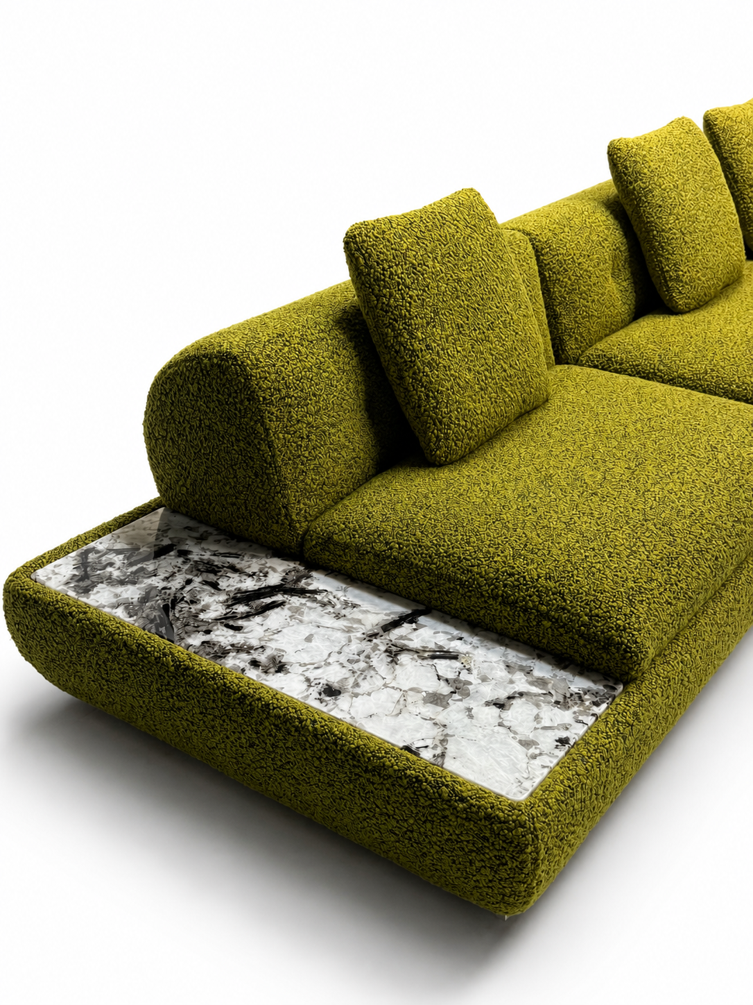 A modern low-profile sofa upholstered in textured olive green bouclé fabric, featuring a white and gray marble-patterned side table integrated into the base, shown on a white background.