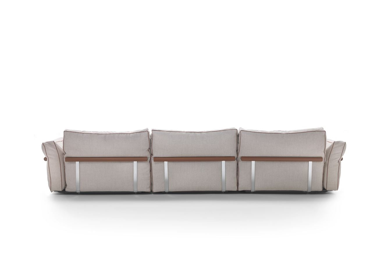 Rear view of the Arthur Modular Sofa with structured back cushions and exposed frame detailing