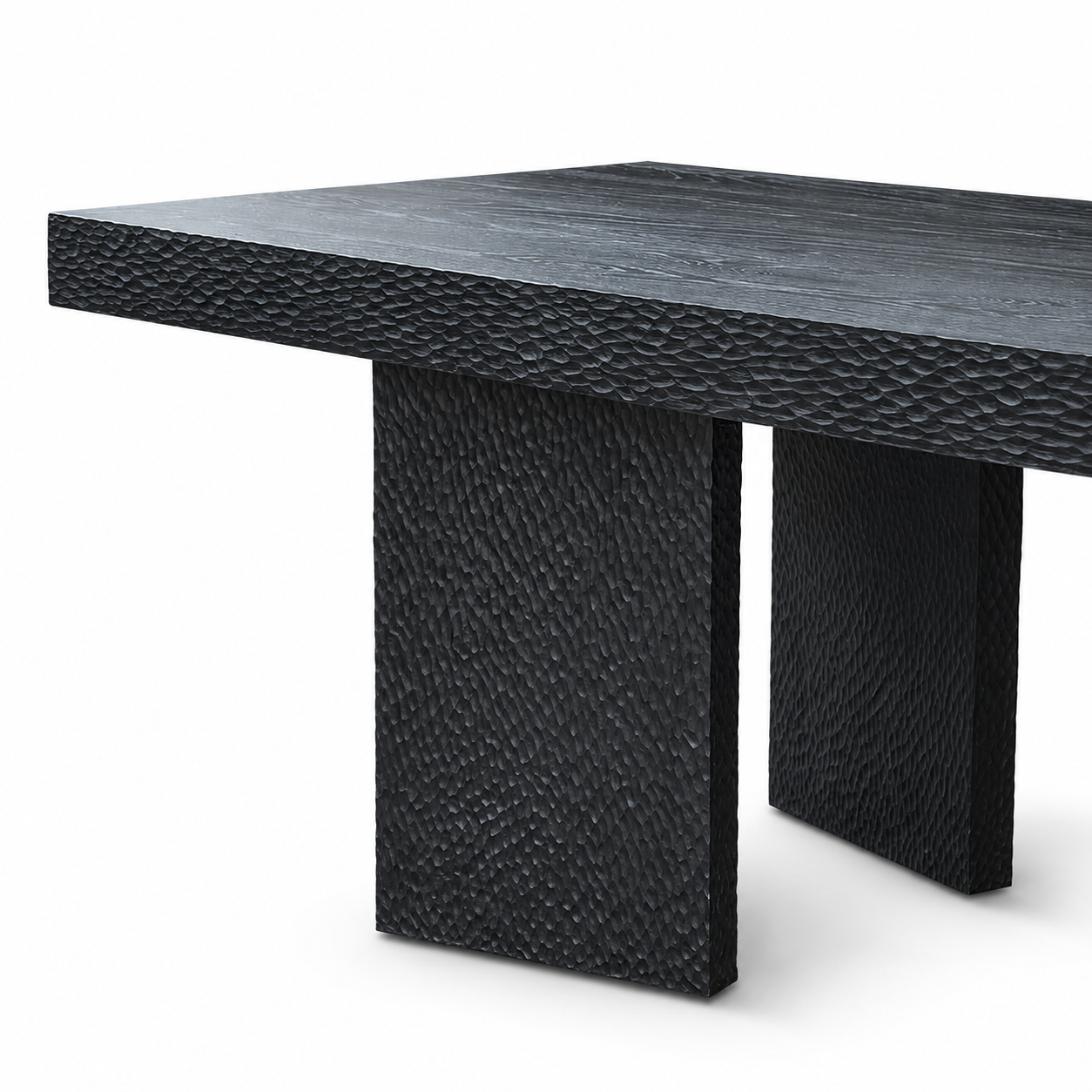 A modern rectangular dining table with a dark textured wood grain top and two thick, textured block legs, shown on a white background.